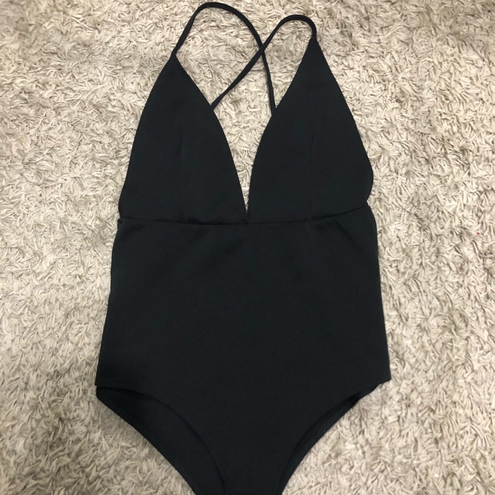 Deep V criss cross body suit